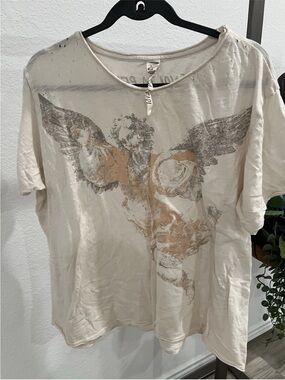 Magnolia Pearl Cream Short Sleeve Angel Graphic Tee with Distressed Tan Accents